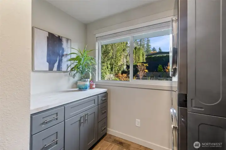 Laundry room folding table and storage