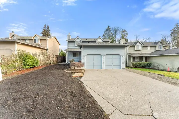 Charming two-story home with a welcoming front entry and a spacious two-car garage. Great curb appeal and plenty of off-street parking.