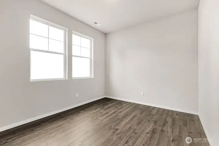 Den off the entry. Pictures are for representational purposes only, colors and features may vary.