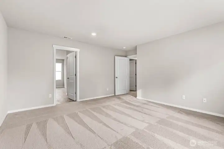 Primary bedroom. Pictures are for representational purposes only, colors and features may vary.