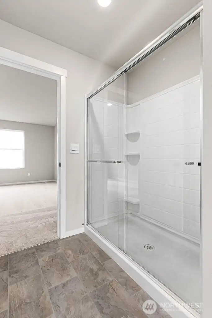 Primary bath will have a tiled showed. Pictures are for representational purposes only, colors and features may vary.