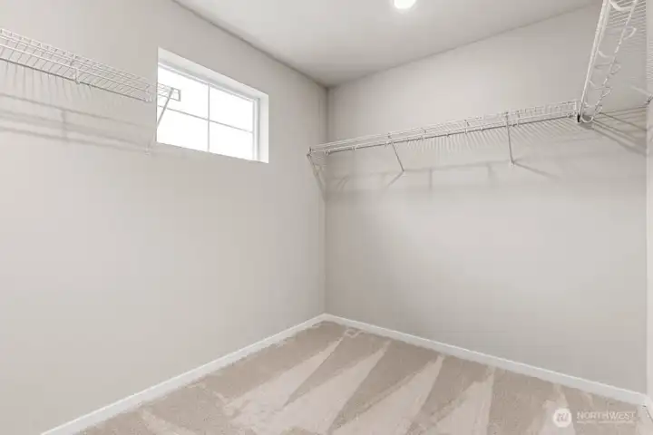 Spacious walk-in closet in the primary. Pictures are for representational purposes only, colors and features may vary.