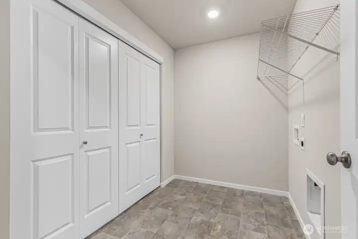 Laundry room upstairs. Pictures are for representational purposes only, colors and features may vary.