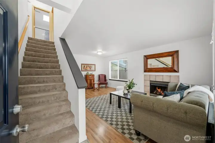 Upon entry you see the large living room with gas fireplace.