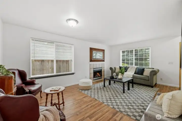 Living area has tons of space.  Create 2 seating areas or use on side as formal dining area.