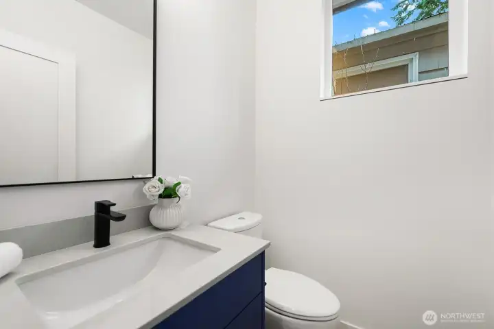 Coveted main floor powder room.