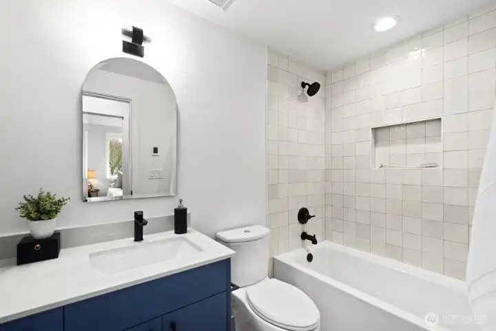Full shared bathroom upstairs.