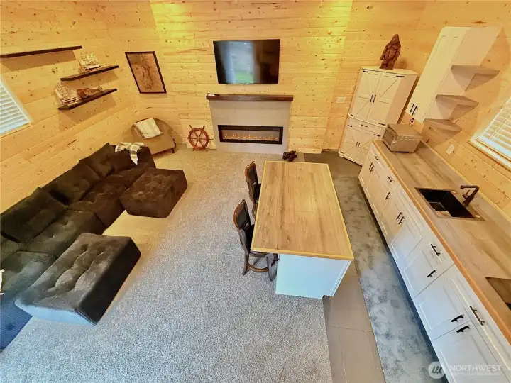 Day Use garage with electric fireplace & tv.