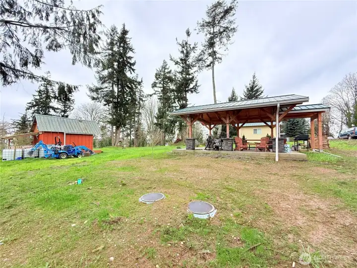 Lids to the 1,000 inground rain capture system