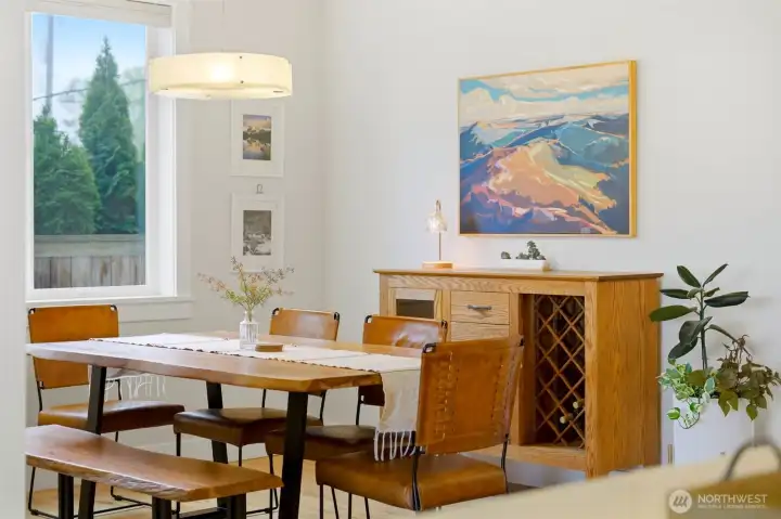 Formal dining beneath coffered tray ceiling with statement chandelier — perfect for hosting. Formal dining beneath coffered tray ceiling with statement chandelier — perfect for hosting.