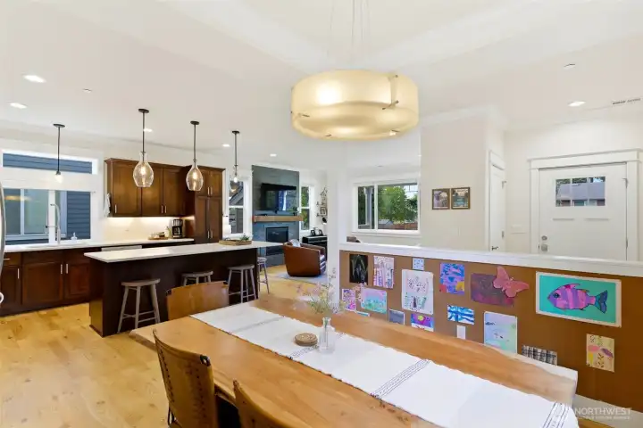 True great-room concept with chef's kitchen, dining, and living all connected — perfect for family life and entertaining. True great-room concept with chef's kitchen, dining, and living all connected — perfect for family life and entertaining.