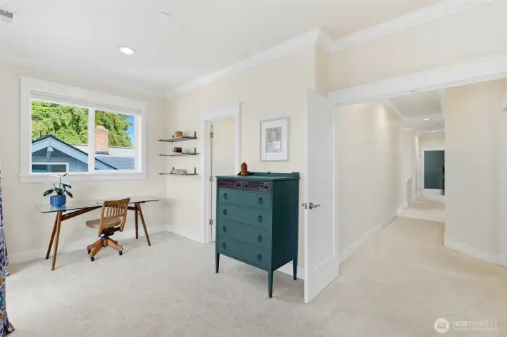 Bonus upstairs landing with built-in shelving — flexible work-from-home nook or reading retreat. Bonus upstairs landing with built-in shelving — flexible work-from-home nook or reading retreat.