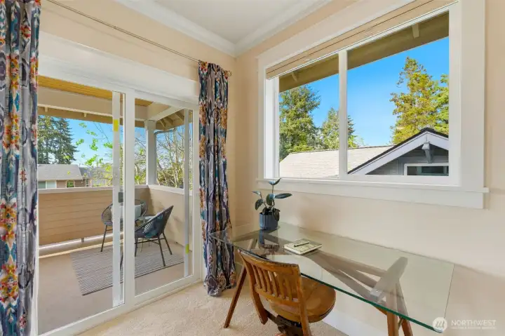 Primary suite opens to a private covered deck — your personal sunset retreat in North Tacoma. Primary suite opens to a private covered deck — your personal sunset retreat in North Tacoma.
