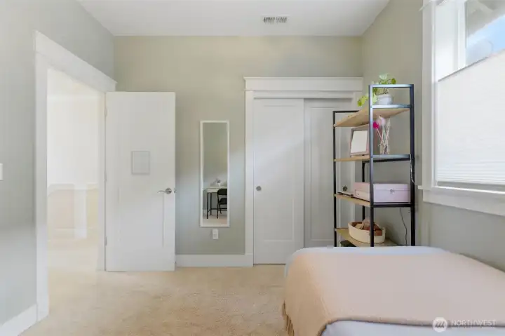Spacious upstairs bedroom with custom paint, generous closet, and natural light. Spacious upstairs bedroom with custom paint, generous closet, and natural light.