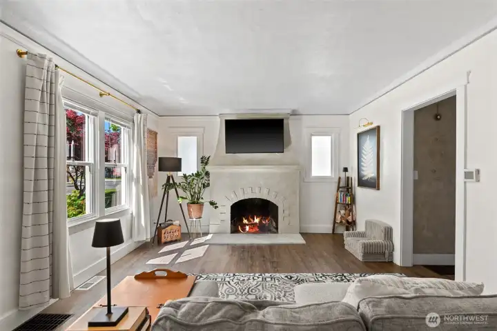 Entry to the left, hall to beds, bath and upper staircase to the right