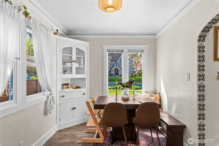 Dining area just off the kitchen.. sweet built in adds charm