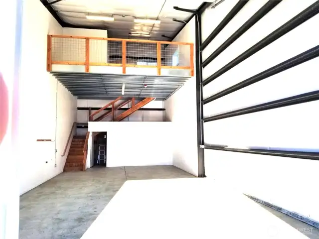 A-Z storage studios. A-9 is a corner unit is 1356 sq. ft. includes the 365 sq. ft. Mezzanine. Development Amenities that dues include: Water-Septic, Storm Water, Video surveillance, Gated with 24/7 access, Fire alarm monitoring, Common area maintenance, 60 ft isles, Exterior of building maintenance, Insurance on the outside of the buildings, Comcast/Xfinity, 2 public bathrooms, Water tank for fire protection Portal Way water systems Class B, garbage / recycle, expansive exterior lighting, Mailboxes, and more. Unit itself has 14 ft high with 12 wide doors with automatic garage door opener, 3/4 bath upstairs including shower. Plumbed for bath downstairs. RV parking plug, electric heat, 100 am service, additional storage room, racks, could be removed.
