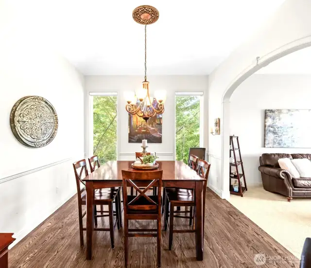 Unique windows frame nature and make for a great dinner party backdrop