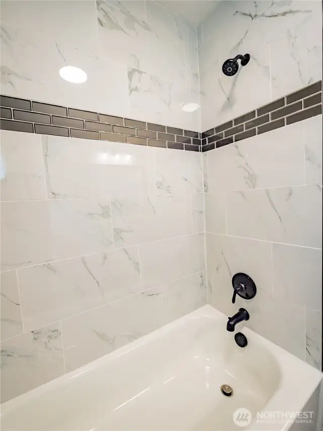 TILED TUB SURROUND...