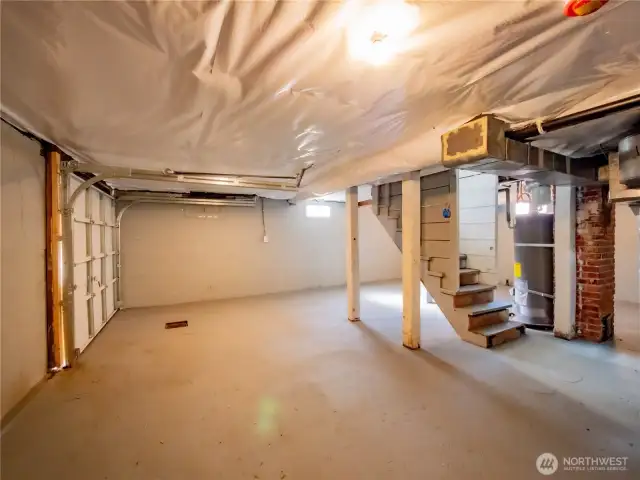 GARAGE OR BASEMENT...FINISH IT FOR MORE LIVING SPACE??