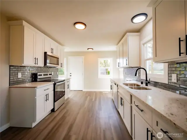 LARGE GALLEY STYLE KITCHEN....TILE BACKSPLASH