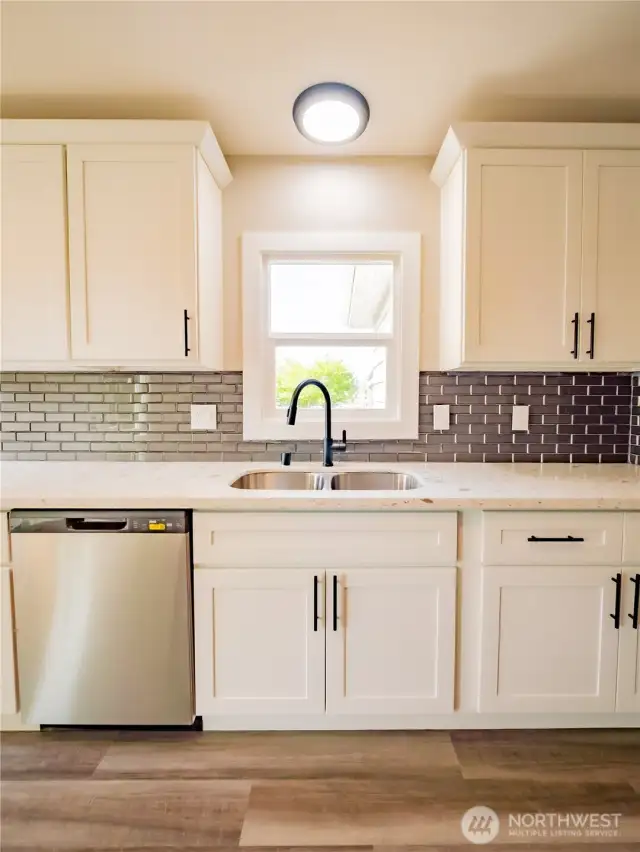 NEW CABINETS AND STAINLESS APPLIANCES