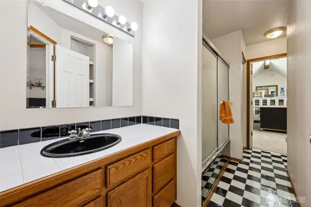 Upstairs bathroom with extra finished room attached..