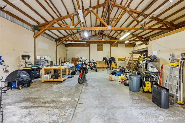 Inside of the shop. Plenty of space for any project imaginable. Headed with its own thermostat and 6" concrete floors.