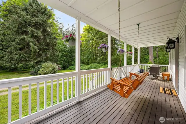 Sip your morning coffee on the covered porch admiring the natural beauty of the property.