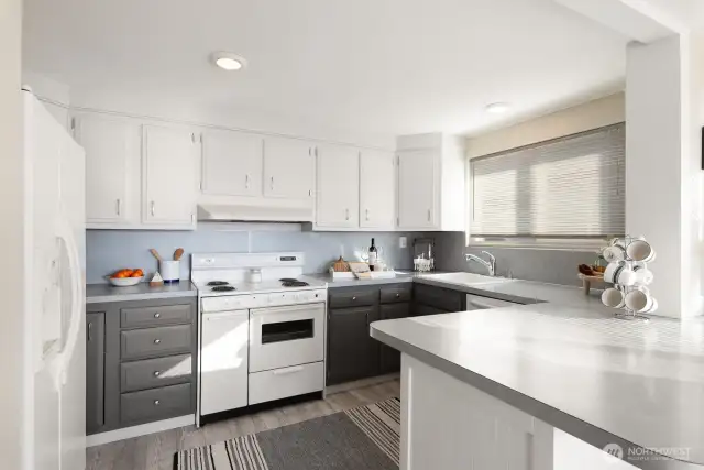 You'll love this charming kitchen. There is a large pantry as well for your Costco runs.