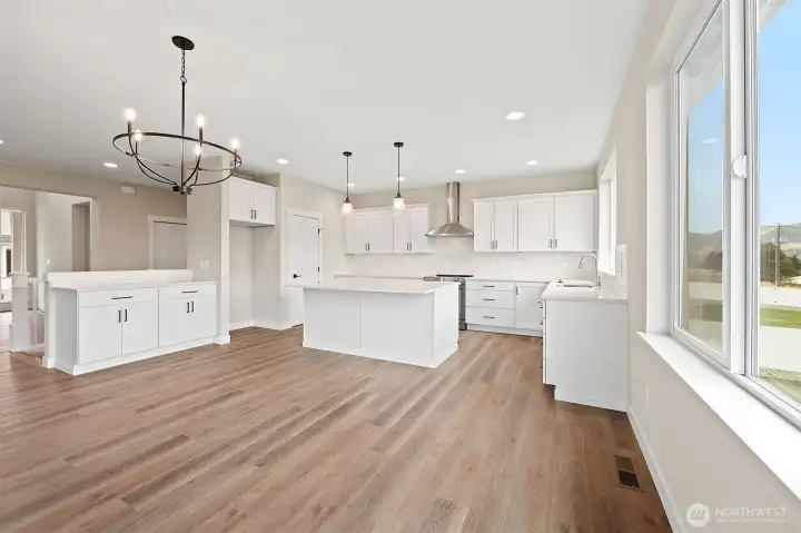 Well appointed kitchen with SO many cabinets