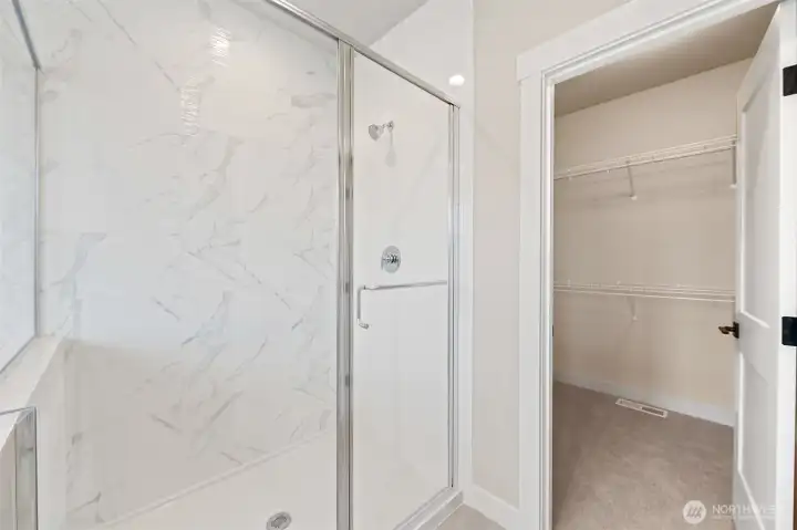 Walk in tiled shower and llarge walk in closet