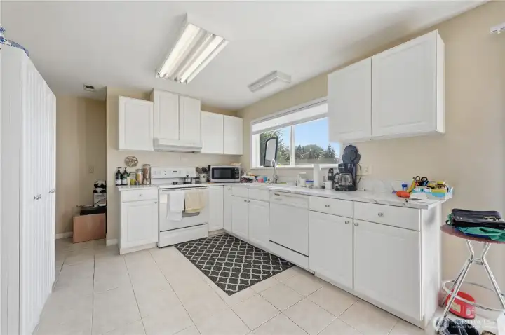 Plenty of cabinets and counter top space.