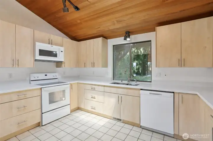 It is so nice to have a large window above the sink...to view the wonders of the great outdoors.