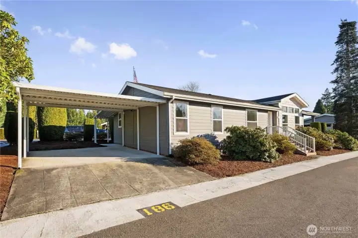 Enjoy the convenience of a spacious two-car carport with covered parking.