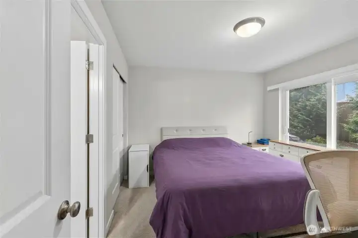 Private first-floor bedroom with an attached full bathroom, ideal for guests or multi-generational living