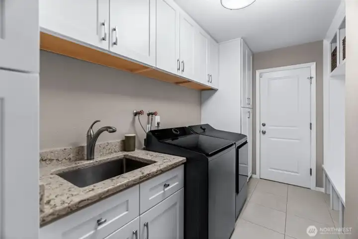 Laundry, utility and mudroom to come into off the garage