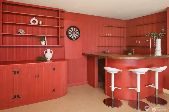 Retro chic! Custom built in bar with seating.