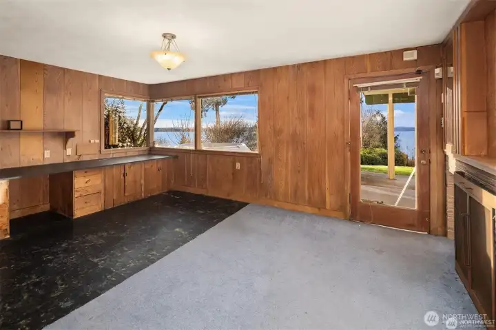 Lower level bonus room with fireplace! Another perfect home office with a view.