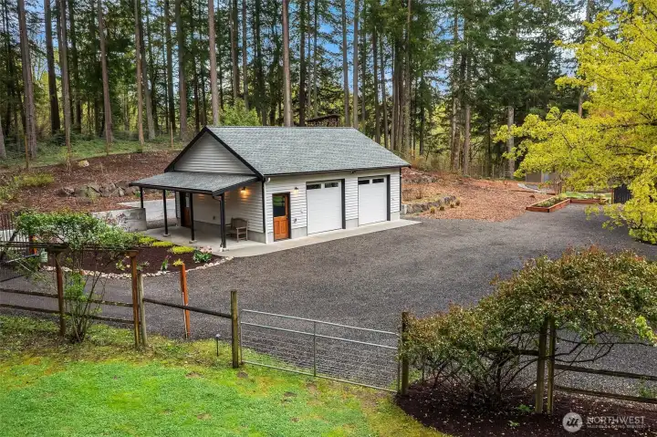 2.5 car garage with plenty of storage space a enough power for 2 EVs.