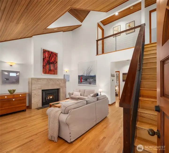 Soaring cedar-clad ceilings greet you at the entrance.