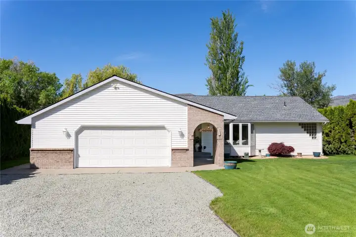 Double car attached garage with workspace