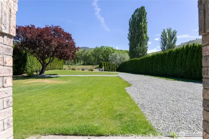 Large back lawn - private gated drive