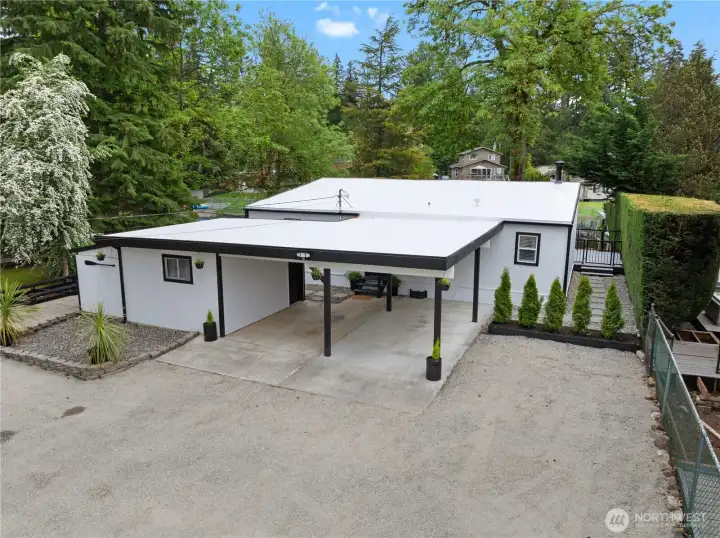 Brand new roof on home and shop.