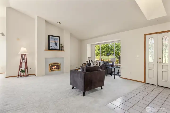 Cozy up to the gas fireplace and enjoy all the natural light!