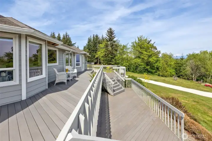 Multiple levels to this gorgeous deck! Under the deck is a door to a Walk-In crawl space. HUGE!! Great storage!