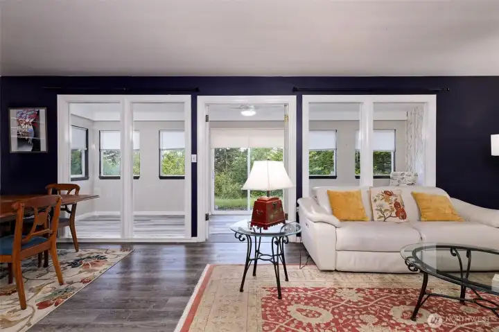 Looking out through the living room to the sunroom Looking out through the living room to the sunroom