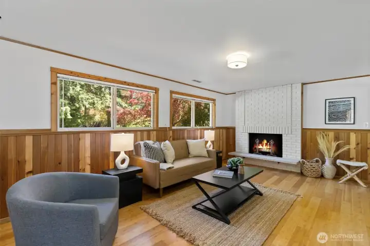 Lower level offers a generously sized family room w/ a cozy fireplace, perfect for relaxing or entertaining. Lower level offers a generously sized family room w/ a cozy fireplace, perfect for relaxing or entertaining.
