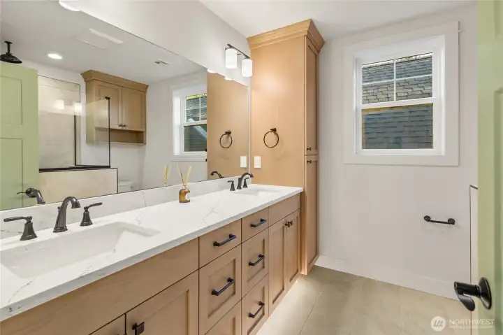 Primary en-suite with double-sink vanity, accent lighting soft-close cabinet and drawers Primary en-suite with double-sink vanity, accent lighting soft-close cabinet and drawers