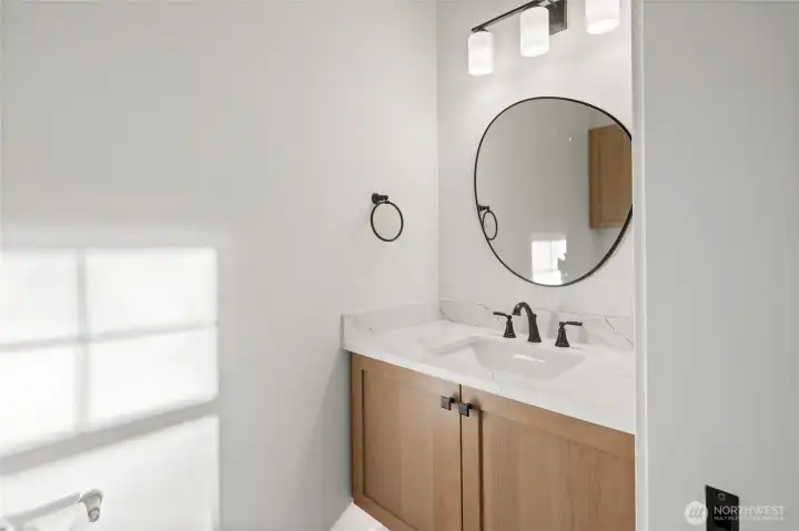 Half bath 1st floor. Soft close cabinets. Accent lights under the cabinets Half bath 1st floor. Soft close cabinets. Accent lights under the cabinets